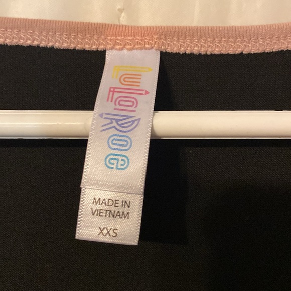 NWT LULaRoe black with pink on top of sleeves. Size xs. 95 polyester 5 spandex - Picture 2 of 8